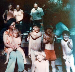 Dave Eaton family~ 1971 picnic, seated L-R=Wynona Eagem (Bunch) with Kelly, Mike Haskey, Tim Eaton, Mark Eaton, Duane Haskey; standin behind= Bob Heth, Dave & Huber Eaton