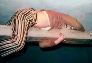 Dave Eaton family~ 1974c, Kelly on a fence rail