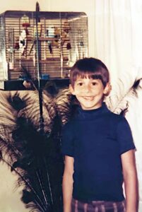 Dave Eaton family~ 1974c, Mark by birdcage