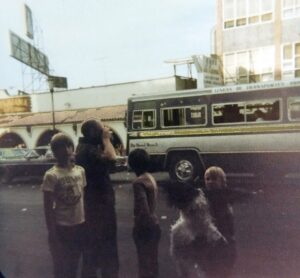 Dave Eaton family~ 1977c, Tijuana, Mexico, Kelly with pinata