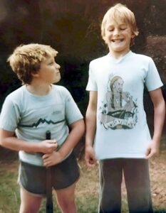 Dave Eaton family~ 1978c, Kelly showing off his t-shirt to Steve Ballew