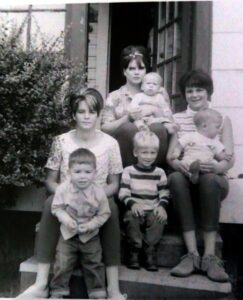 Dave Eaton family~ Michele Tanata with Mike, unkown woman named Merry & baby in back, Terri with Tim & Mark, b&w- 01