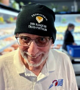 Eaton, Dave~ 2022, 07, 20, Trois Rivieres, QC wearing stocking cap at Fromagerie des Basque, Chloe Gritten pic