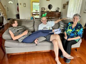 Eaton, Dave~ 2022, 08, 09, Pointe Claire, QC~ at home with wife Toni Nazair & grand niece, Chloe Gritten- 01