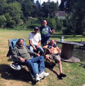 Eaton, Tim~ 2018, 07, in his field with brothers Mark & Kelly & cousin Mike Haskey- 02
